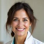 Professional headshot of Dr. Anya Sharma, a warm and insightful health coach